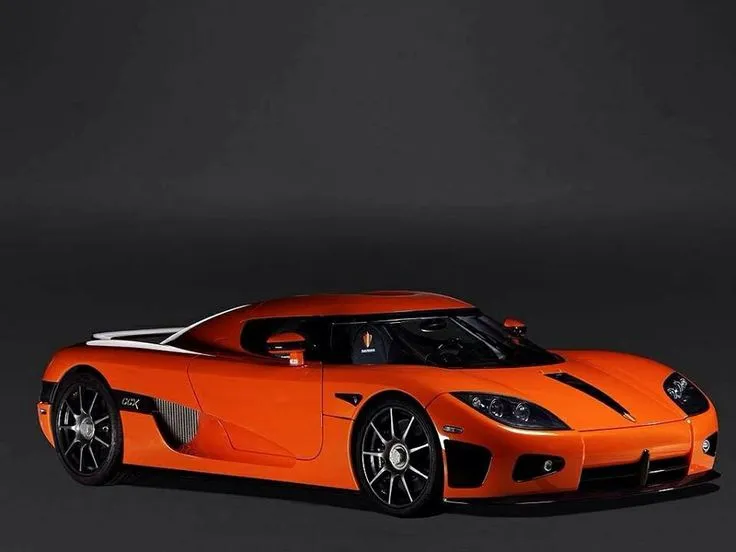 an image of an sports car in orage color