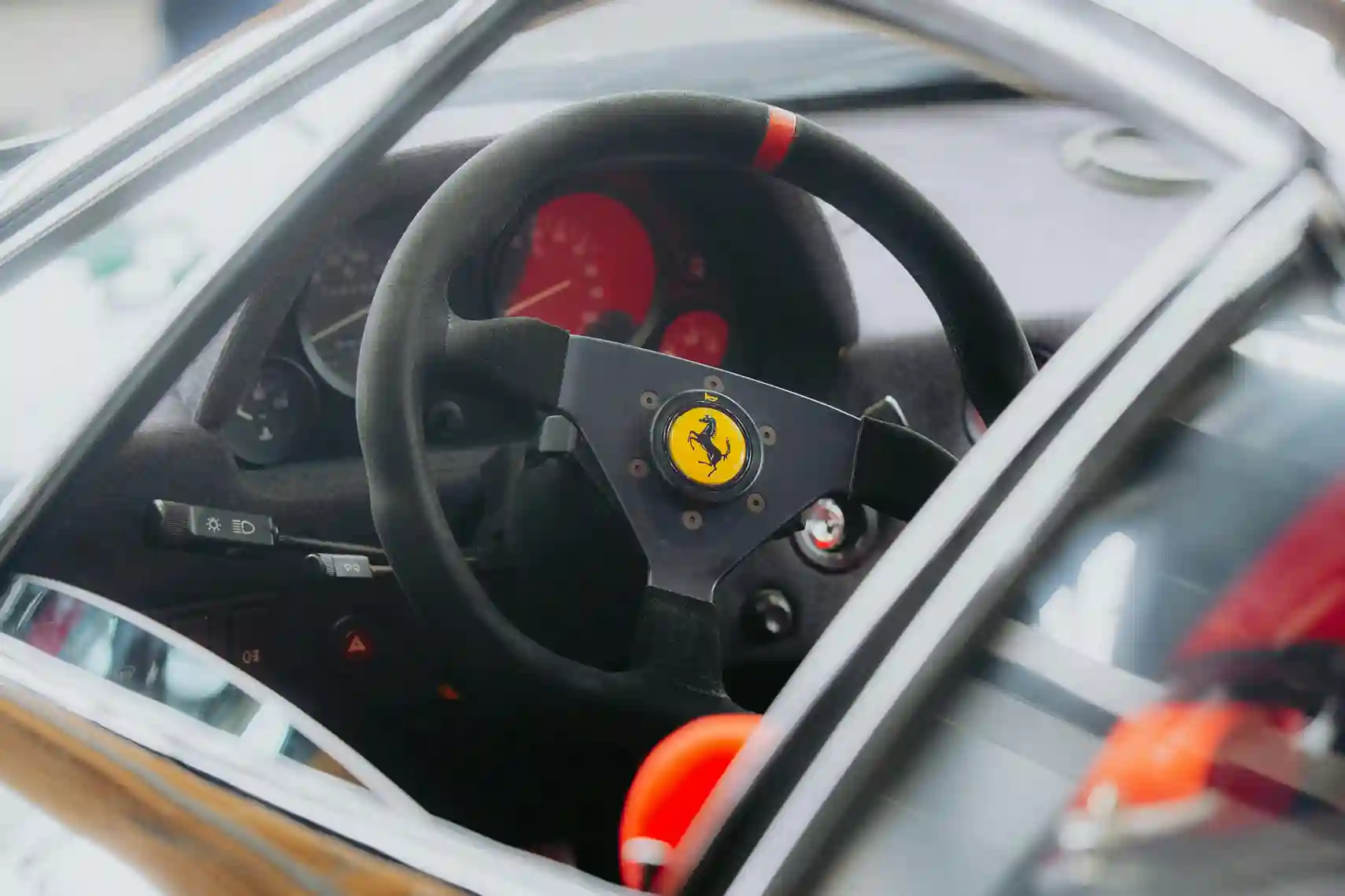 a close-up image of a Ferrari cars interior