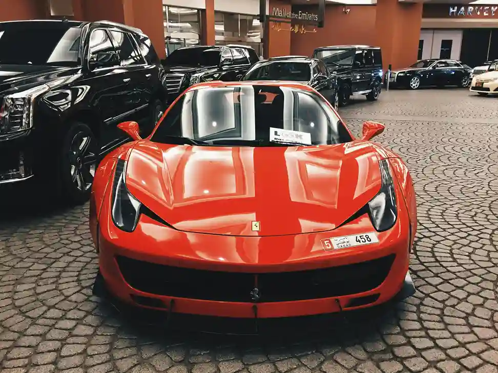 an image of a sports car in red color