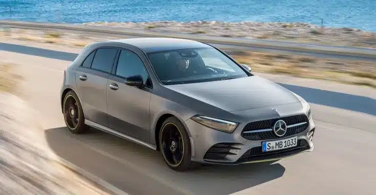 an image of a Mercedes Hatchback moving on the road 