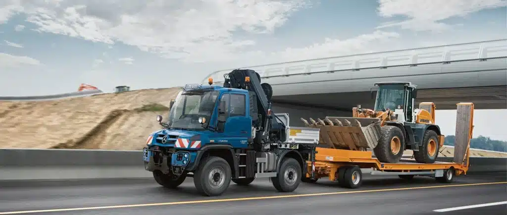 an image showing a blue colour construction truck