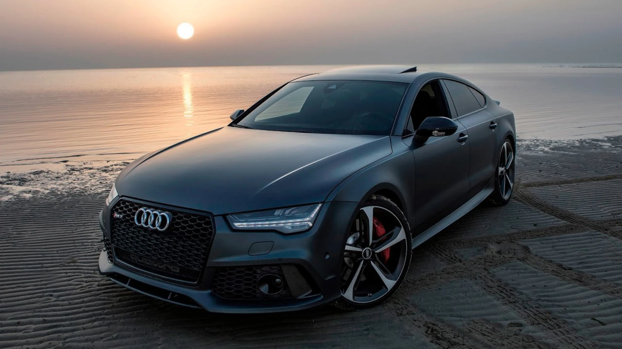 an image showing audi- is audi a luxury car?
