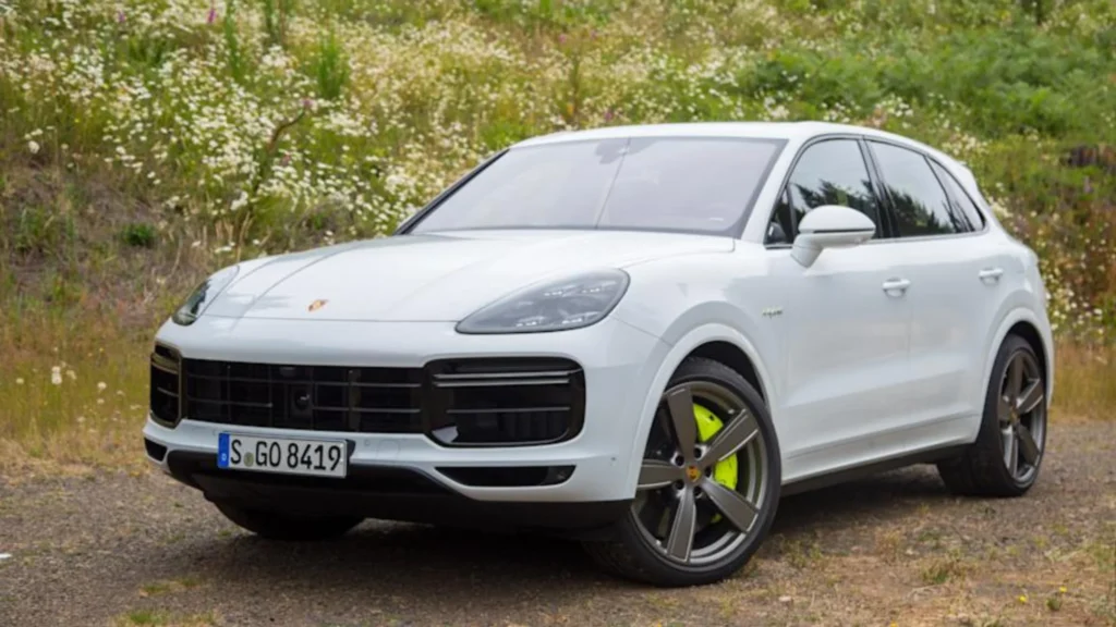 an image showing a white Porsche Cayenne