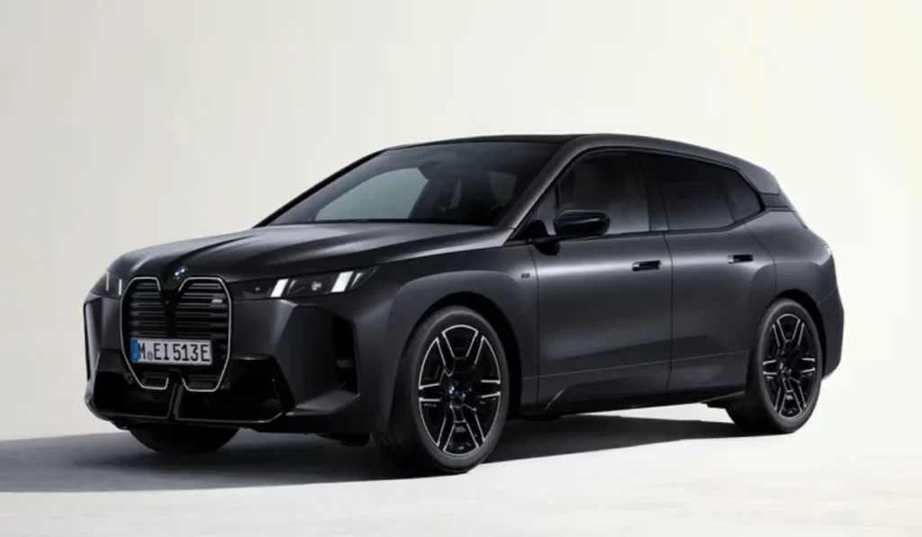 an image showing a blac sedan