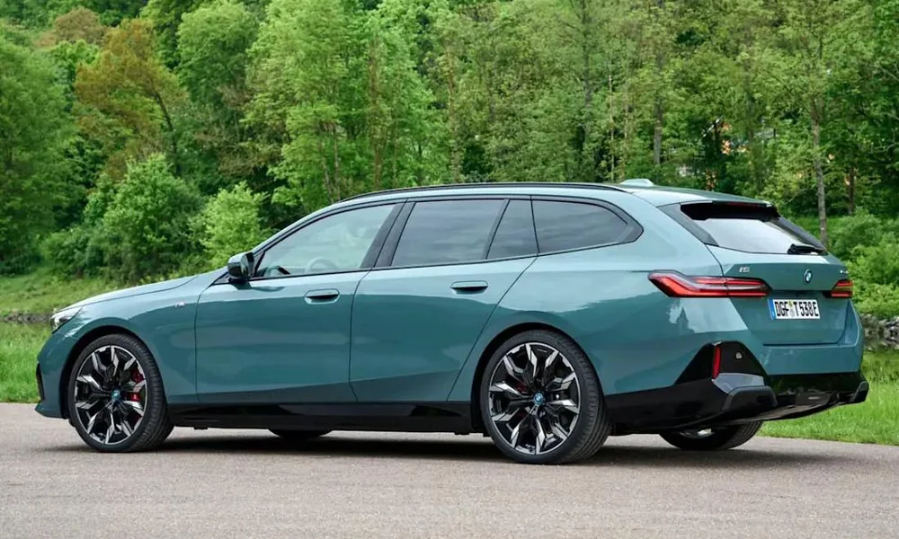Modern station wagon showing its extended roof and rear cargo space.