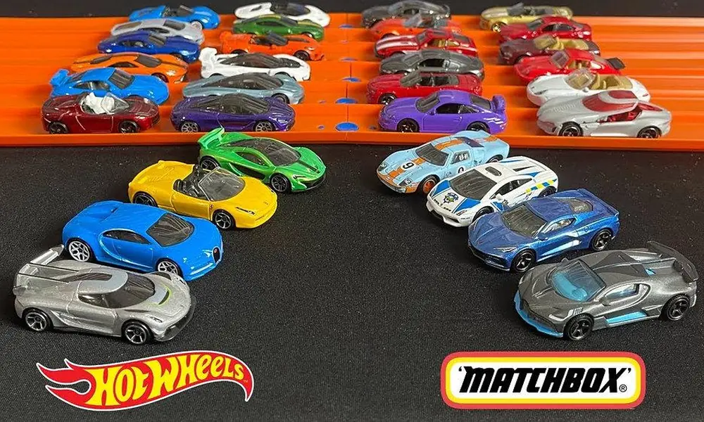 Matchbox and Hot Wheels miniature cars displayed side by side.