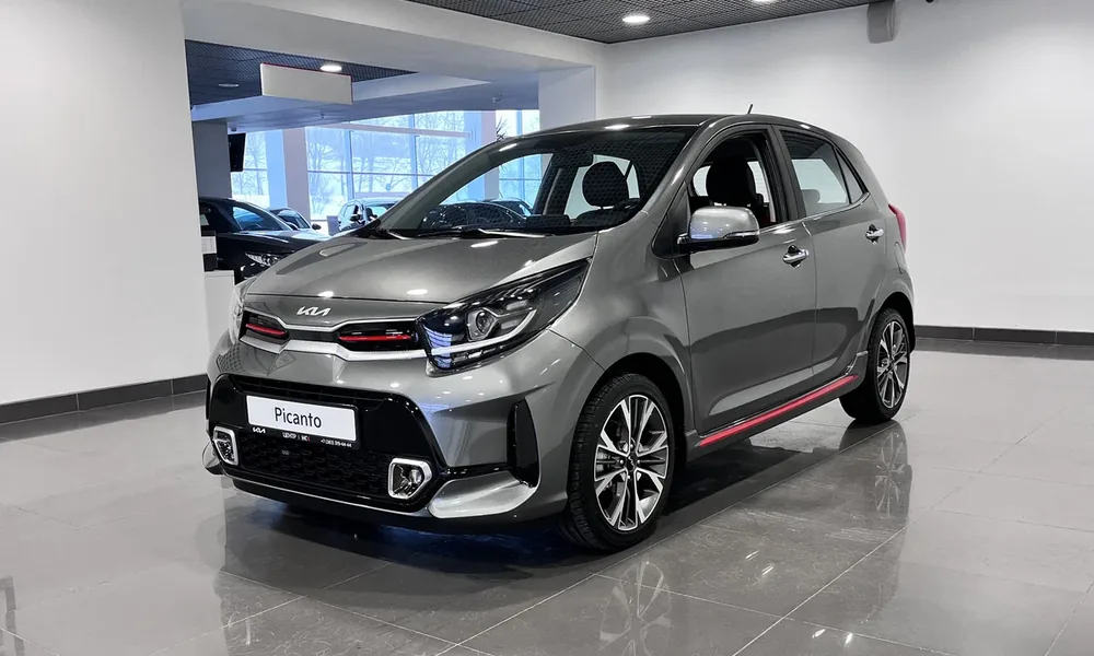 Grey Kia Picanto hatchback with red trim in a car showroomGrey Kia Picanto hatchback with red trim in a car showroomGrey Kia Picanto hatchback with red trim in a car showroomGrey Kia Picanto hatchback with red trim in a car showroom
