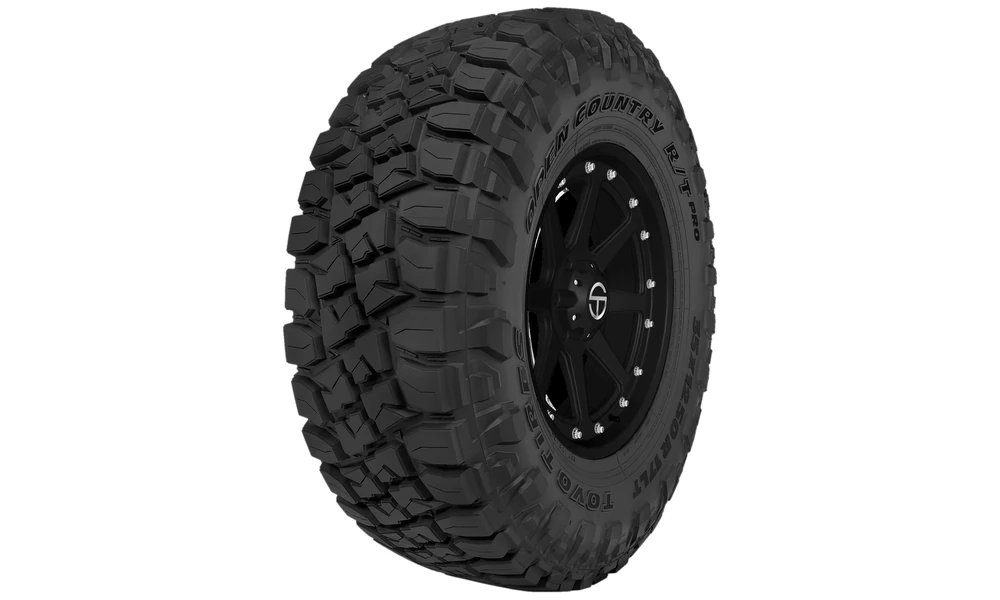 Toyo Open Country R/T Pro rugged-terrain tire with chunky shoulder blocks on a black wheel