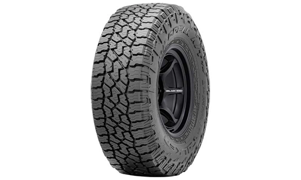 Falken Wildpeak A/T4W all-terrain tire with multi-directional tread pattern on a black Black Rhino wheel