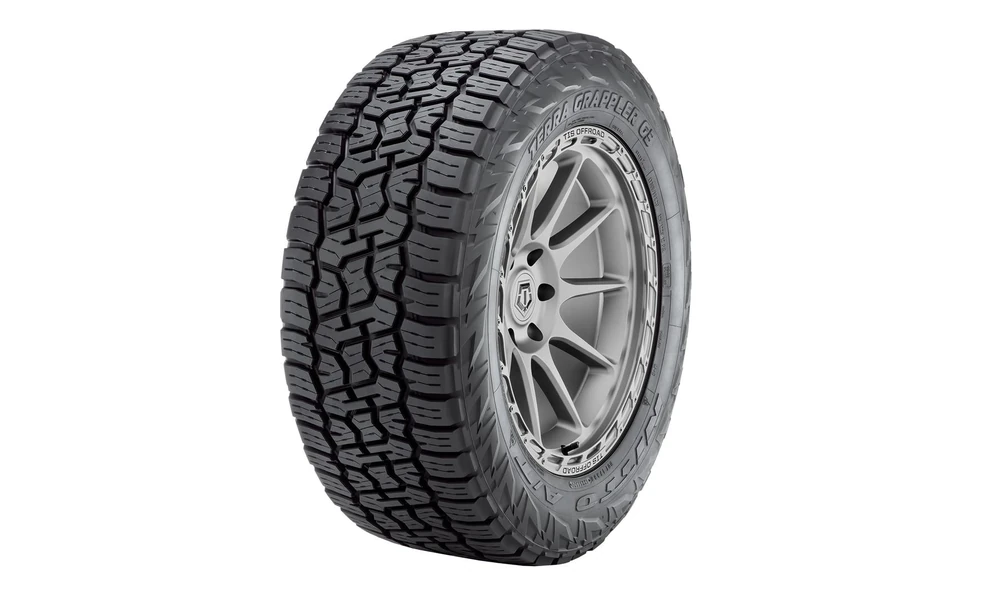 Nitto Terra Grappler G2 all-terrain tire with sculpted sidewall design on a gray multi-spoke wheel