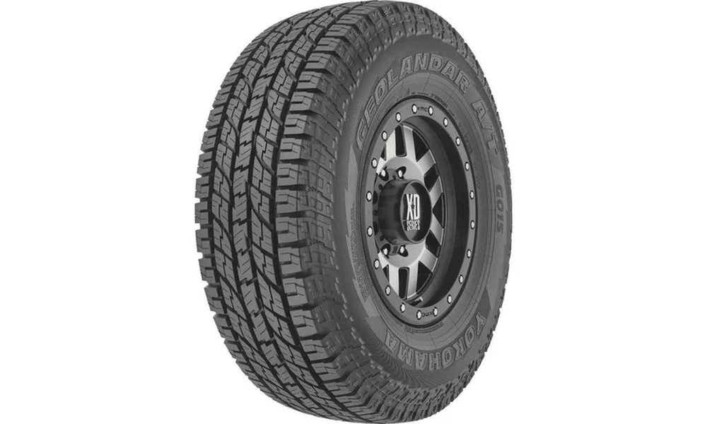 Yokohama Geolandar A/T G015 all-terrain tire with symmetrical tread on a black and machined XD Series wheel
