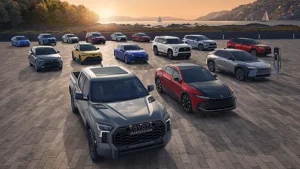 Modern lineup of sedans, SUVs, and electric cars in an outdoor setting.