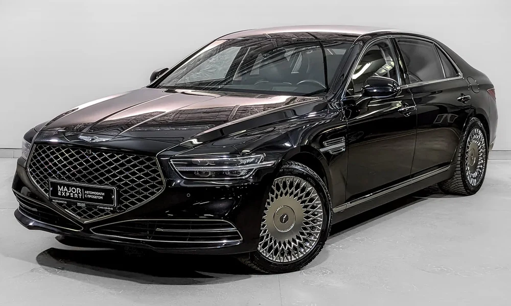 Genesis G90 full-size sedan showing its spacious luxury-oriented design.