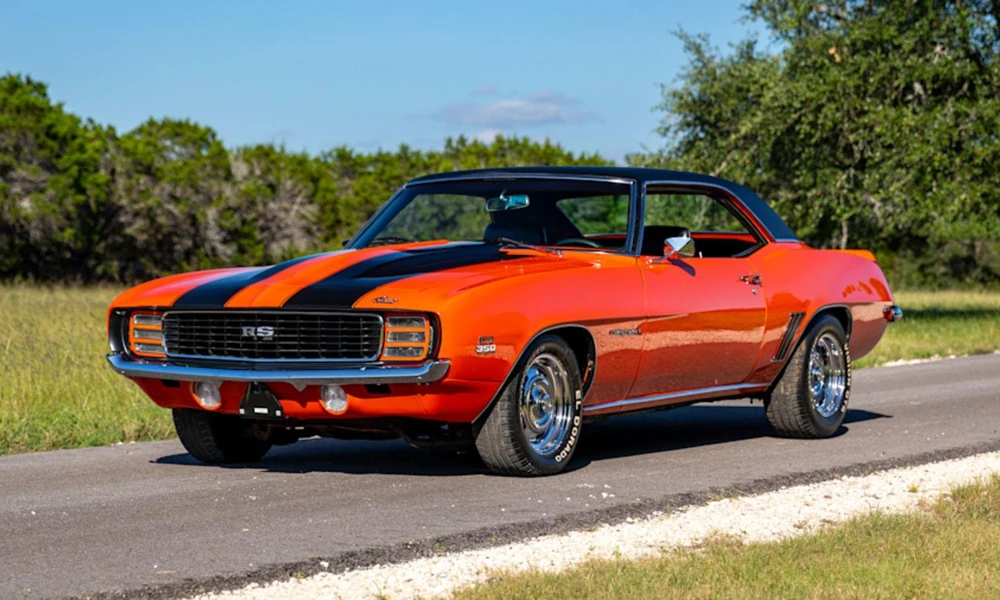 Classic Chevrolet Camaro muscle car with a long hood and sporty body.
