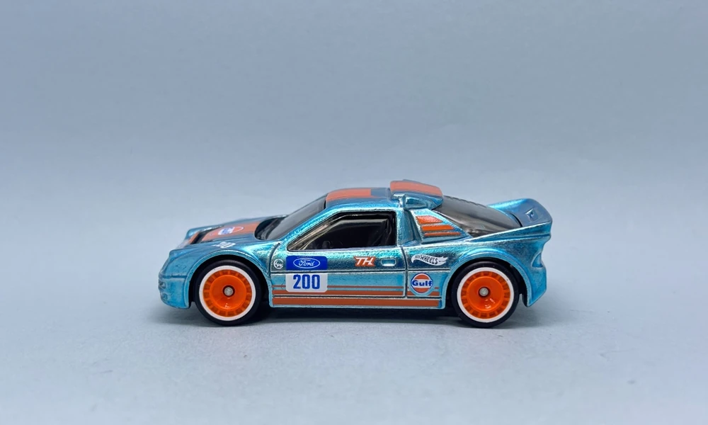Blue Spectraflame-style Hot Wheels Ford RS200 with orange wheels and Gulf livery