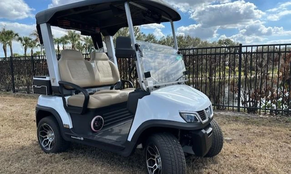 Modern electric golf cart with rechargeable battery power.