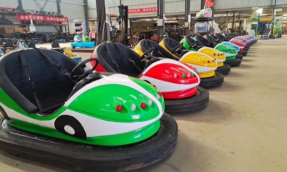 New electric bumper cars displayed together for commercial amusement equipment purchasing.