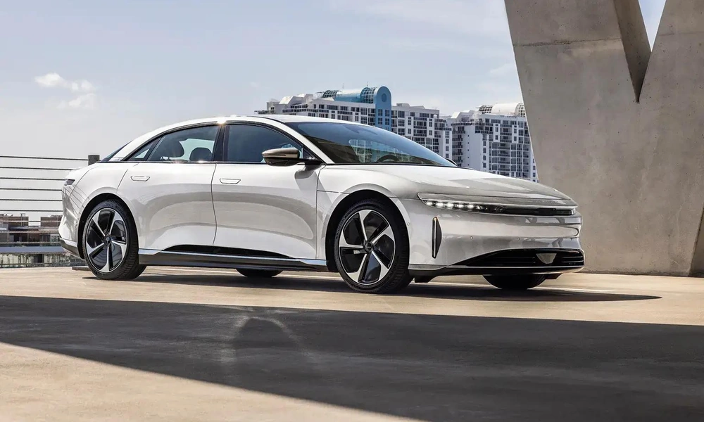 Silver Lucid Air Touring luxury electric sedan viewed from the front.
