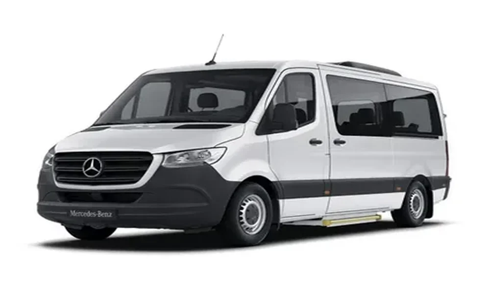 Silver and white Mercedes-Benz Sprinter passenger van with tinted windows, shown from the front three-quarter angle on a white background.
