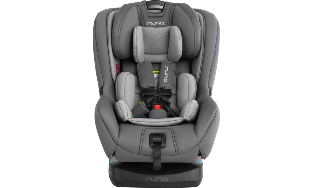 Nuna RAVA Next convertible car seat with padded gray upholstery and five-point harness