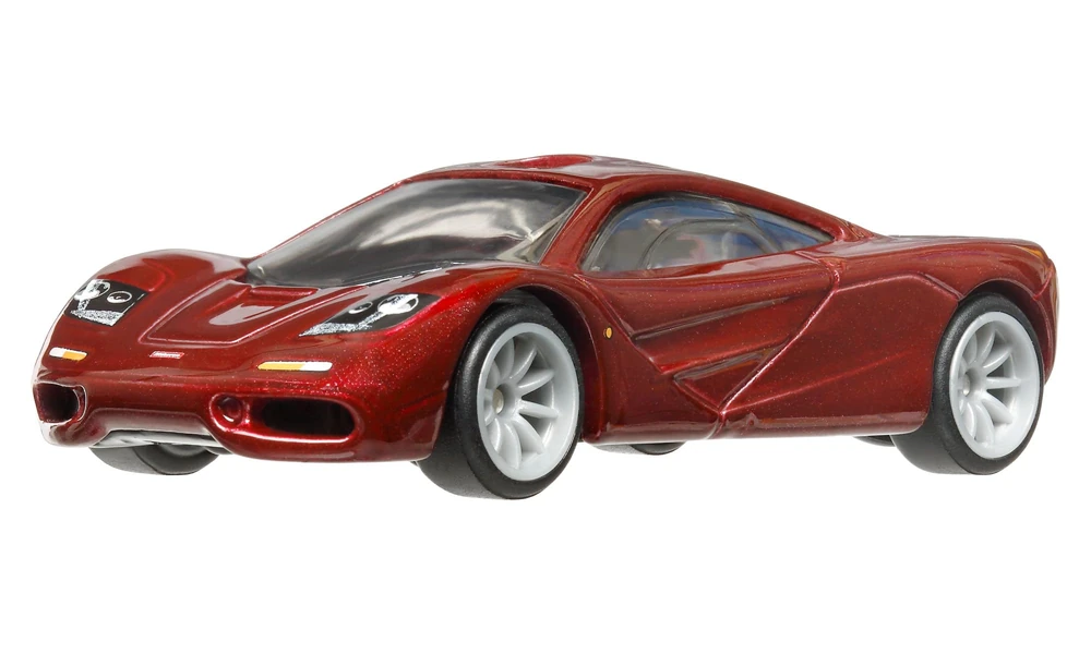 Red premium Hot Wheels McLaren F1 model with rubber tires and detailed headlights
