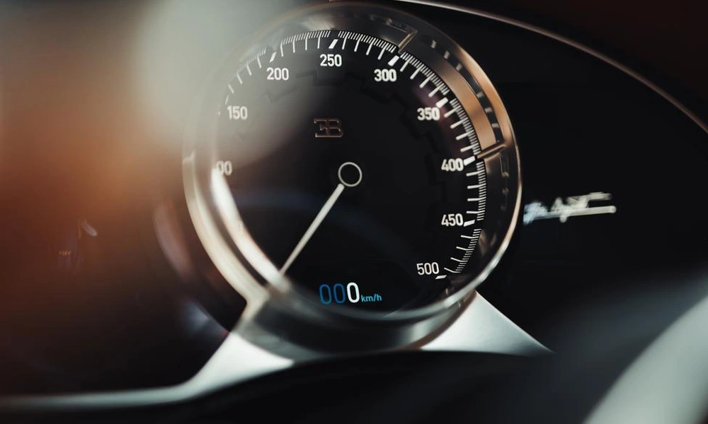 Close-up of a performance car speedometer.